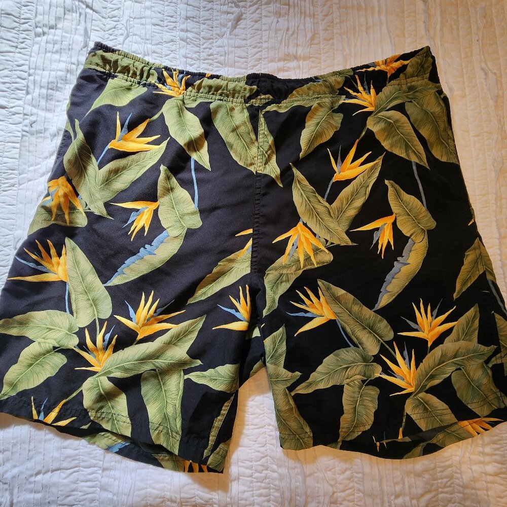 Consensus Sportswear black with floral design swim trunks, size Medium